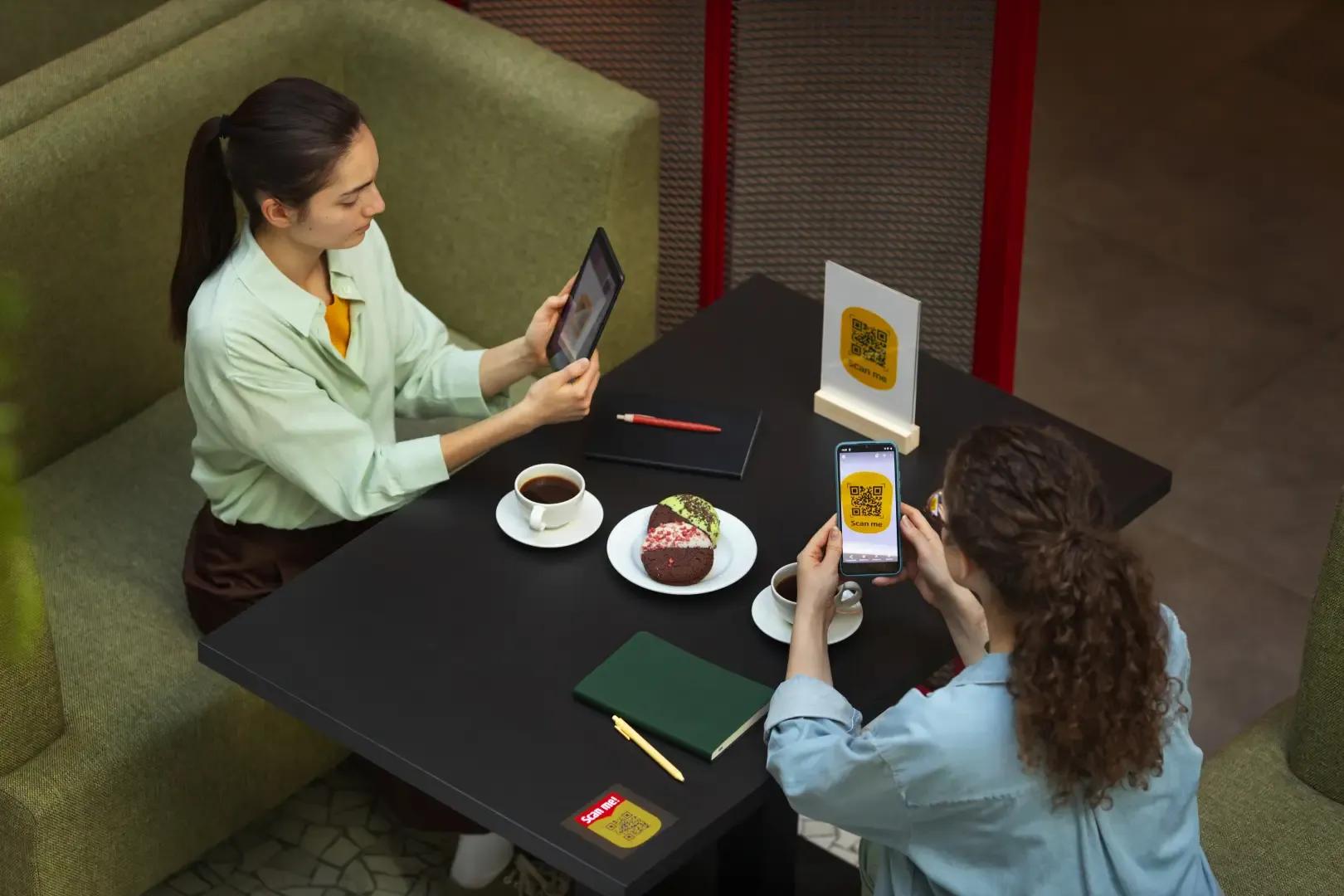 Hotel guests scanning a QR code to browse services and place orders through a contactless service system in a hotel