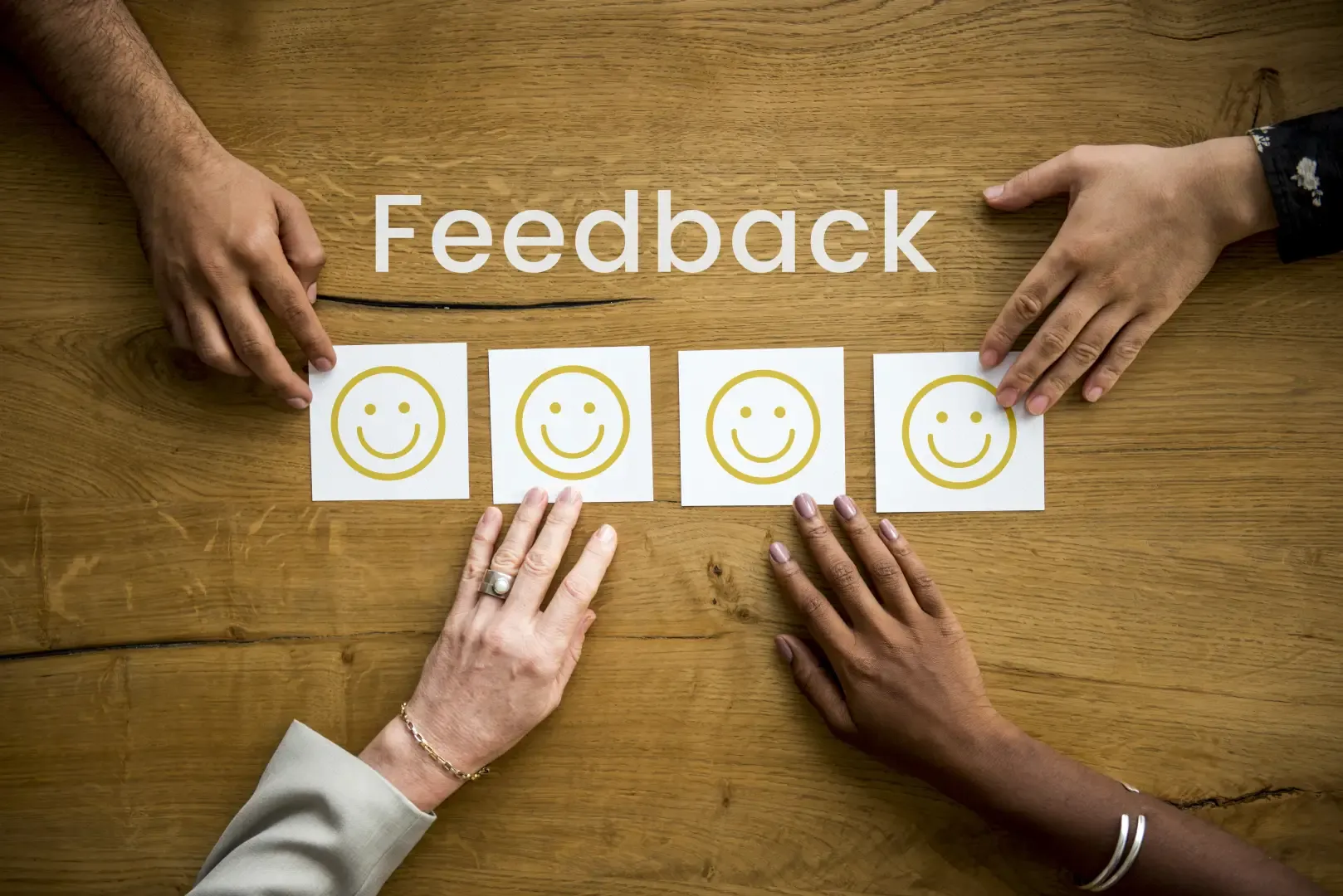 Hotel guest feedback survey with positive customer satisfaction ratings and review cards on a table